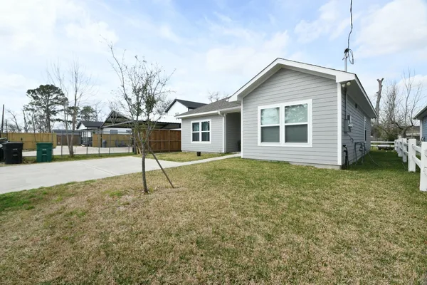 a house view with a garden space