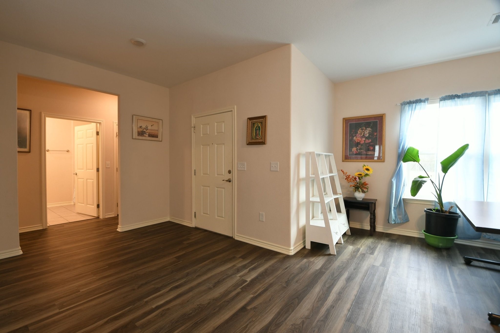 5817 Gaston Houston, TX 77016 - Photo 10 of 24 a view of livingroom with furniture and wooden floor
