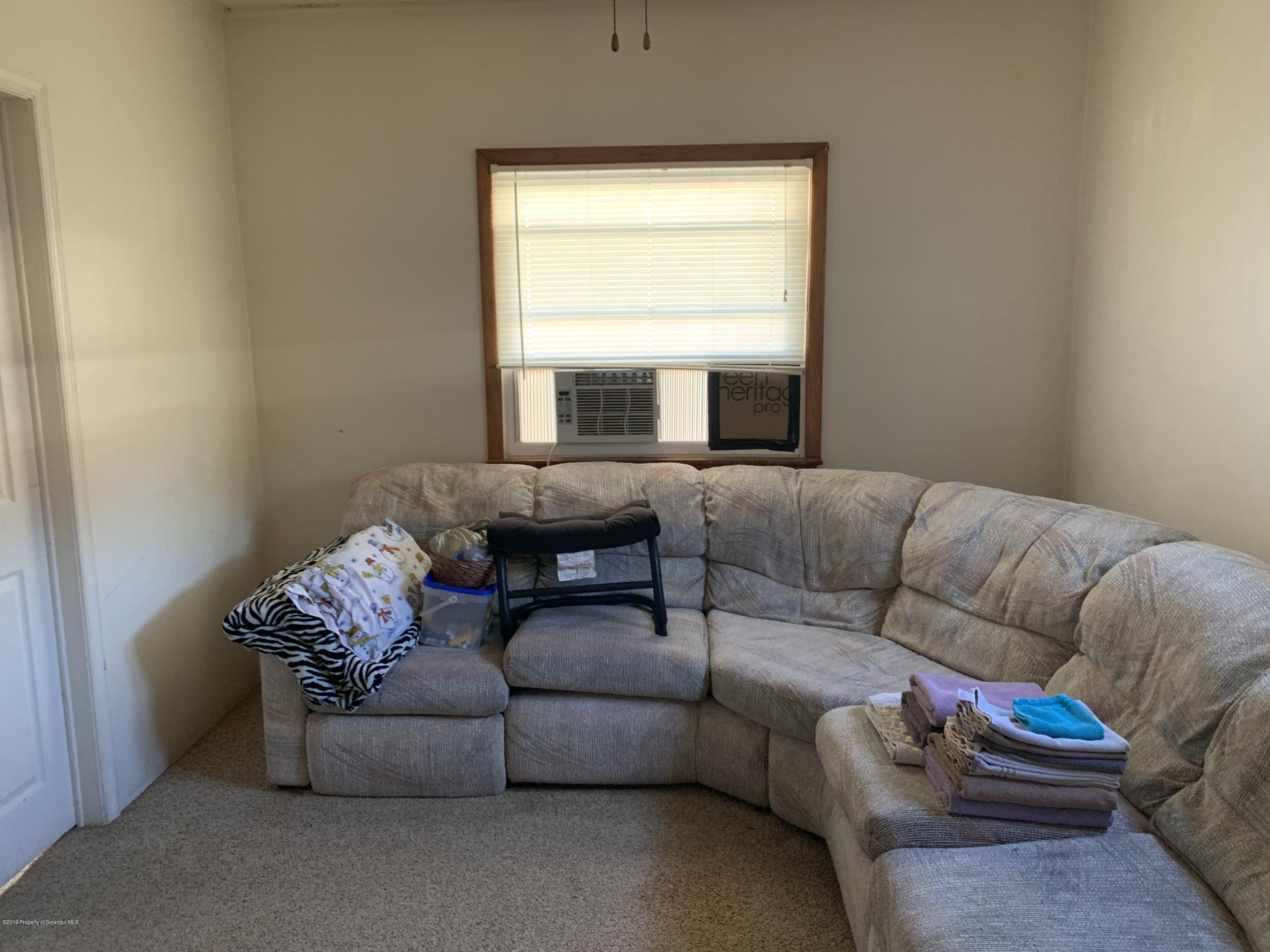 1849 Clearview Street Scranton, PA 18508 - Photo 11 of 21 a living room with furniture and a window