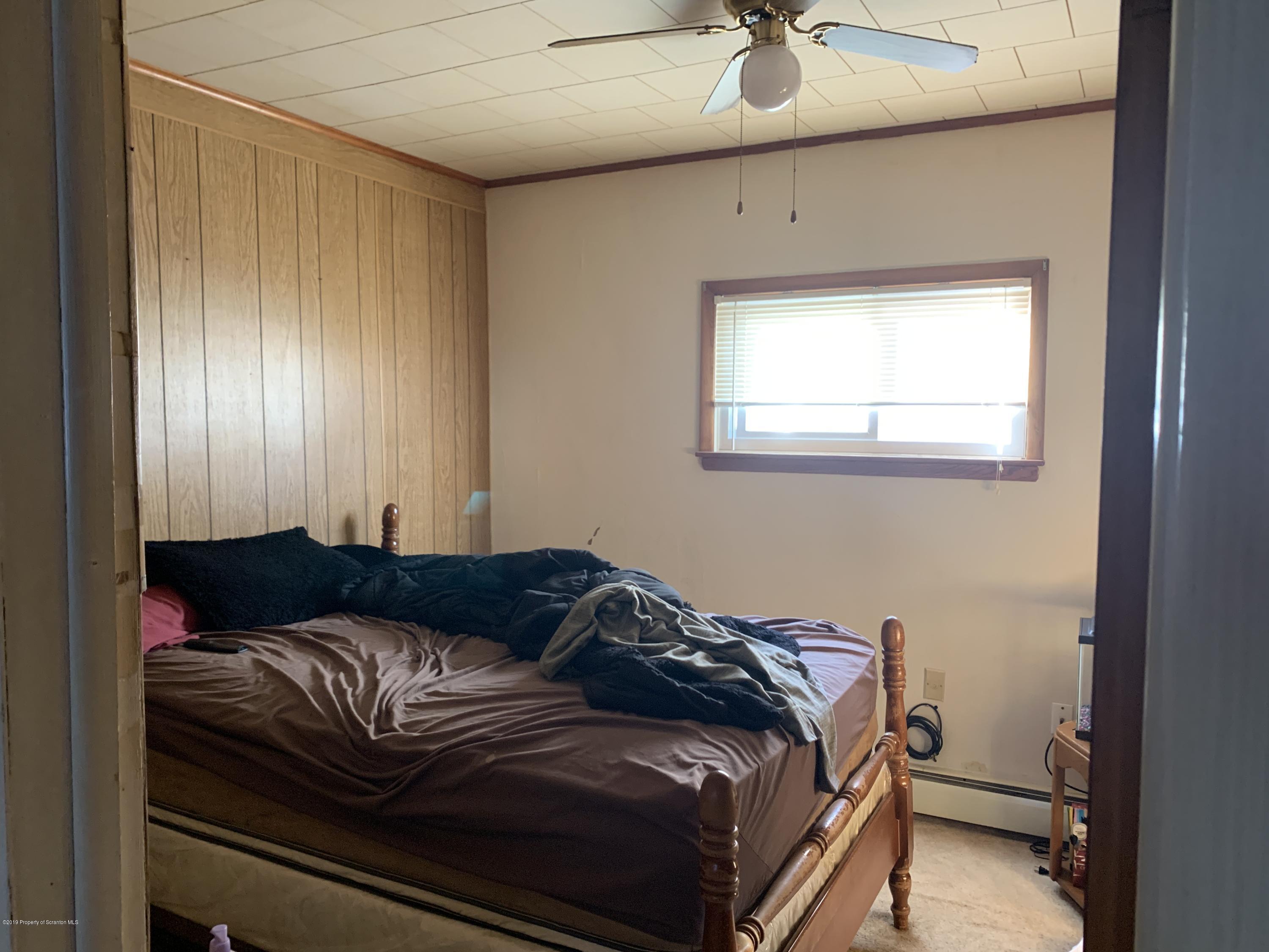1849 Clearview Street Scranton, PA 18508 - Photo 12 of 21 a bedroom with a bed and window