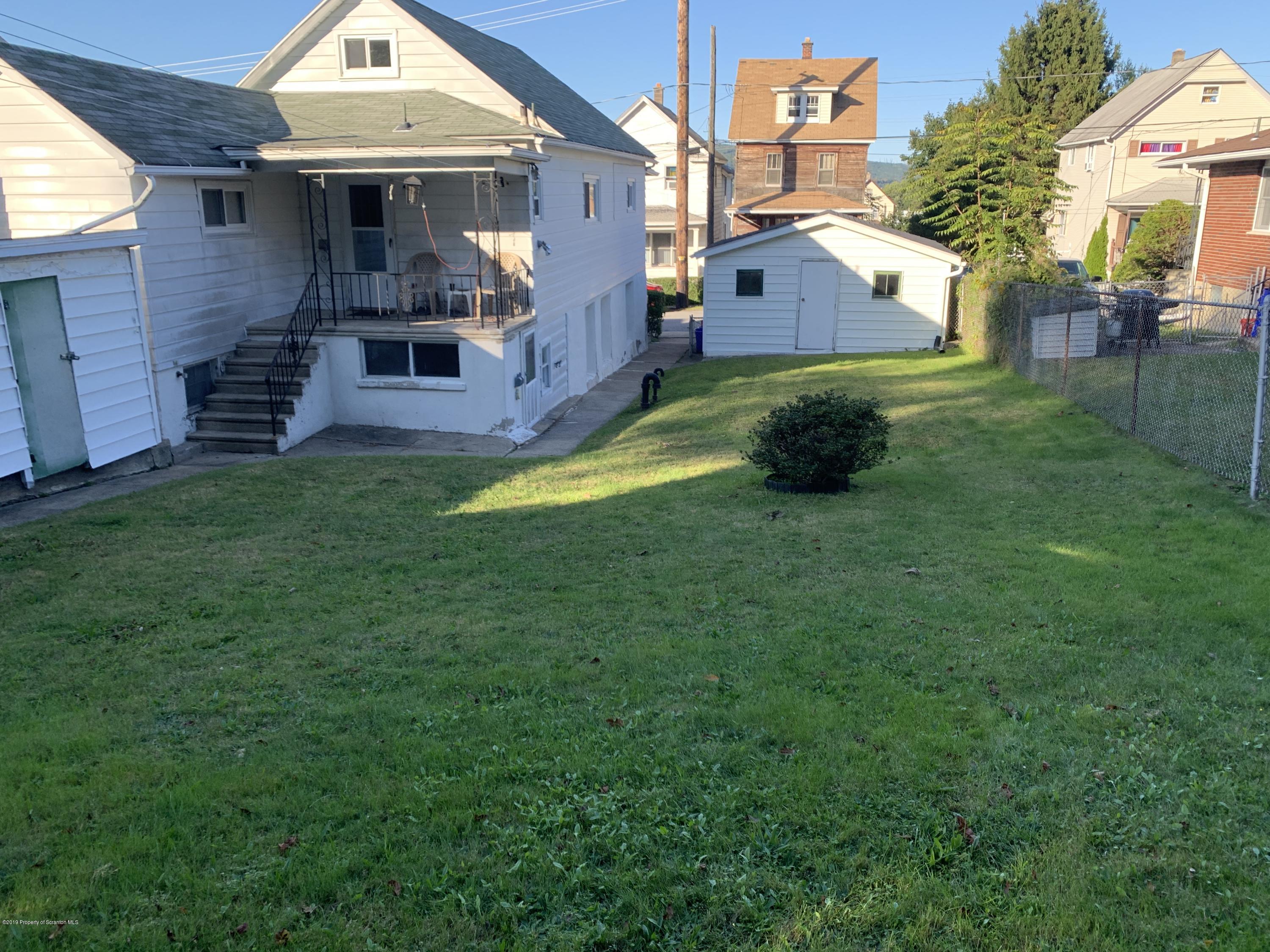 1849 Clearview Street Scranton, PA 18508 - Photo 18 of 21 a front view of a house with a yard