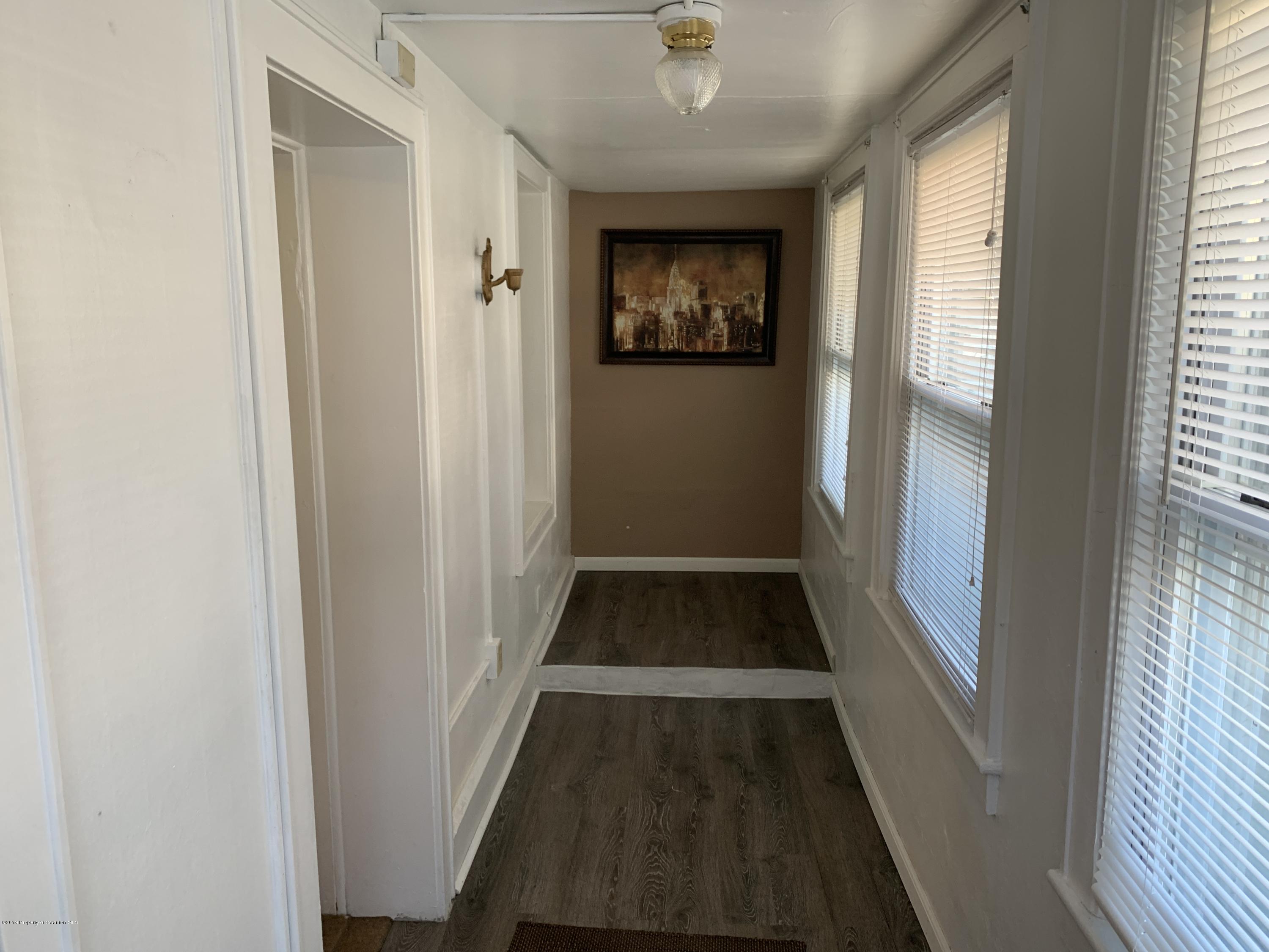 1849 Clearview Street Scranton, PA 18508 - Photo 2 of 21 a view of a hallway with wooden floor and a window