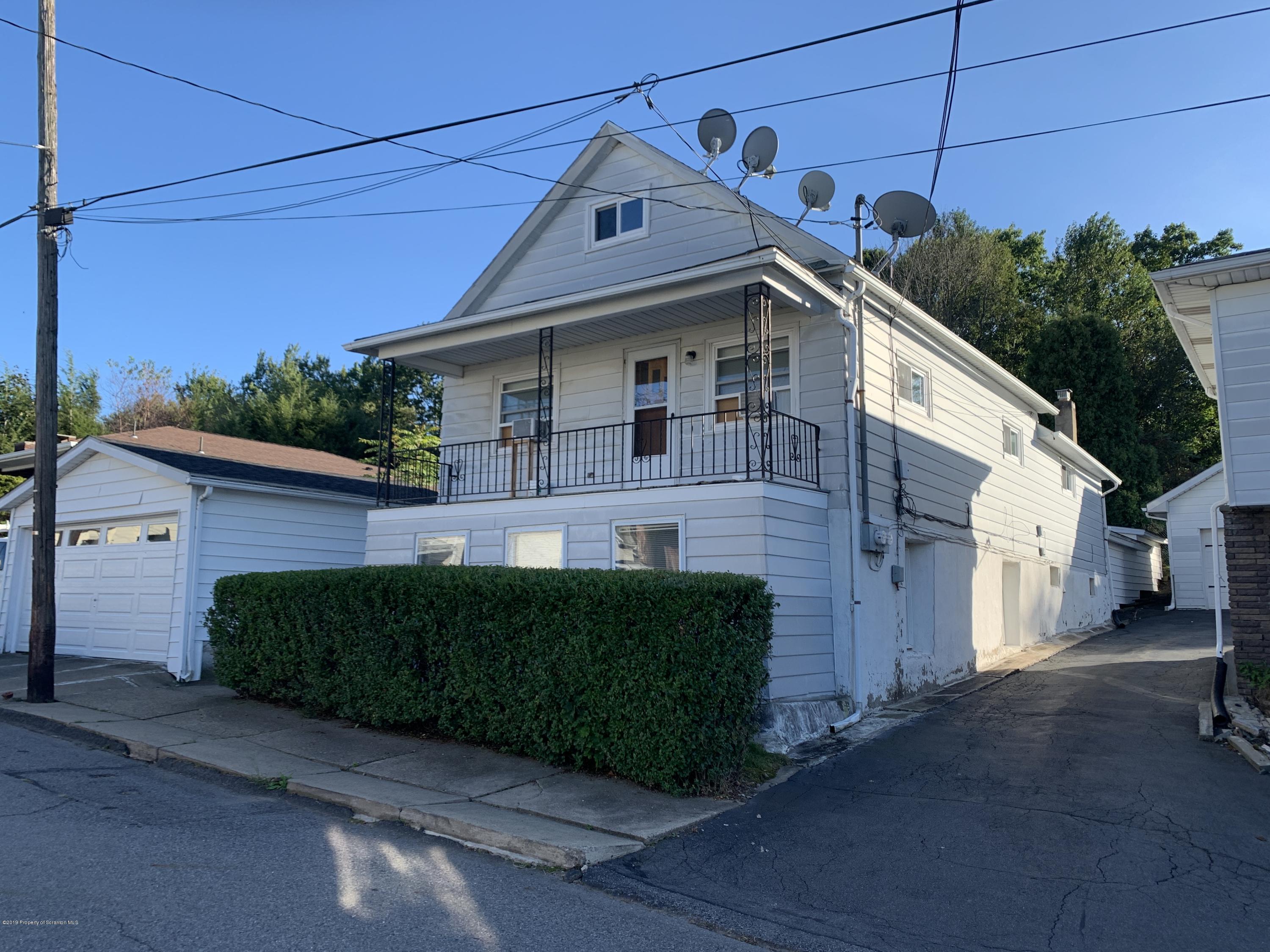 1849 Clearview Street Scranton, PA 18508 - Photo 21 of 21 a front view of a house with a yard