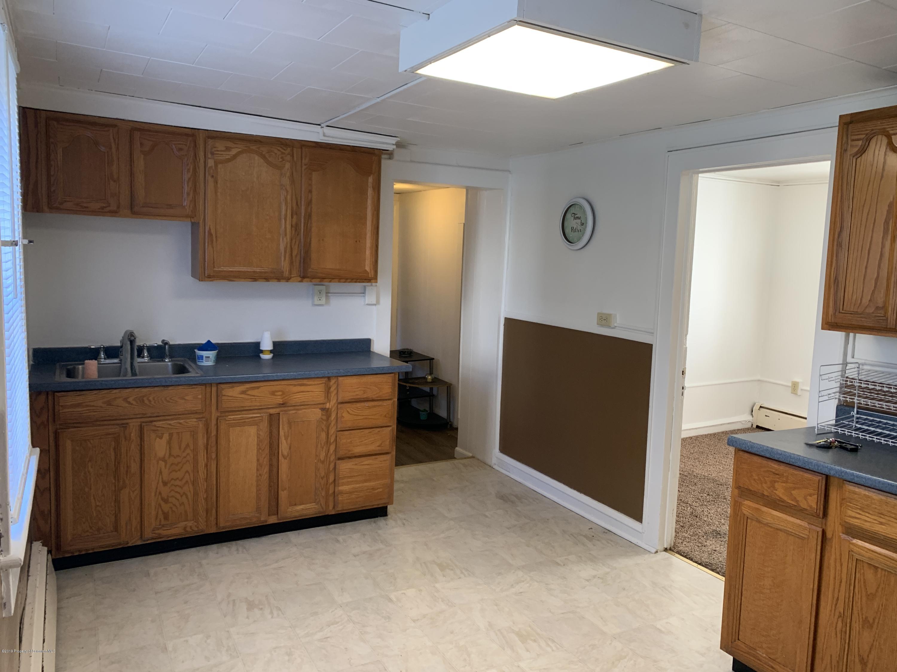 1849 Clearview Street Scranton, PA 18508 - Photo 5 of 21 a kitchen with stainless steel appliances granite countertop a refrigerator and a stove top oven