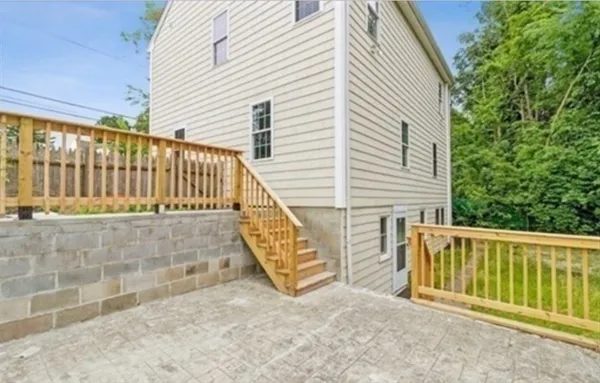 a view of balcony with small garden
