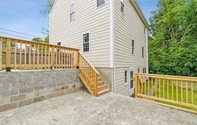 a view of balcony with small garden