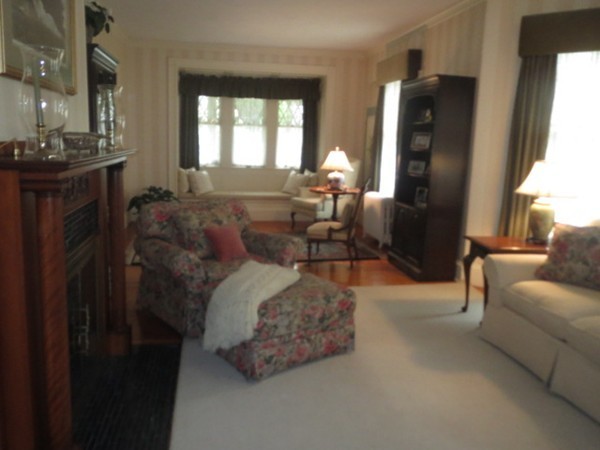 54 Garfield Street Springfield, MA 01108 - Photo 4 of 30 a living room with furniture and a fireplace