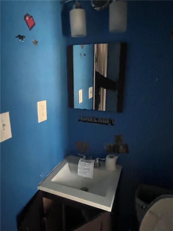 5430 Old Bill Cook Road College Park, GA 30349 - Photo 12 of 21 a bathroom with a sink and a mirror