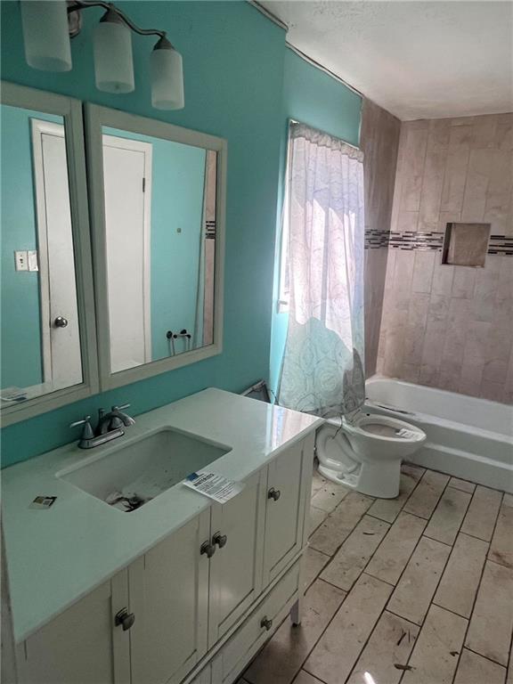 5430 Old Bill Cook Road College Park, GA 30349 - Photo 10 of 21 a bathroom with a sink and mirror with toilet