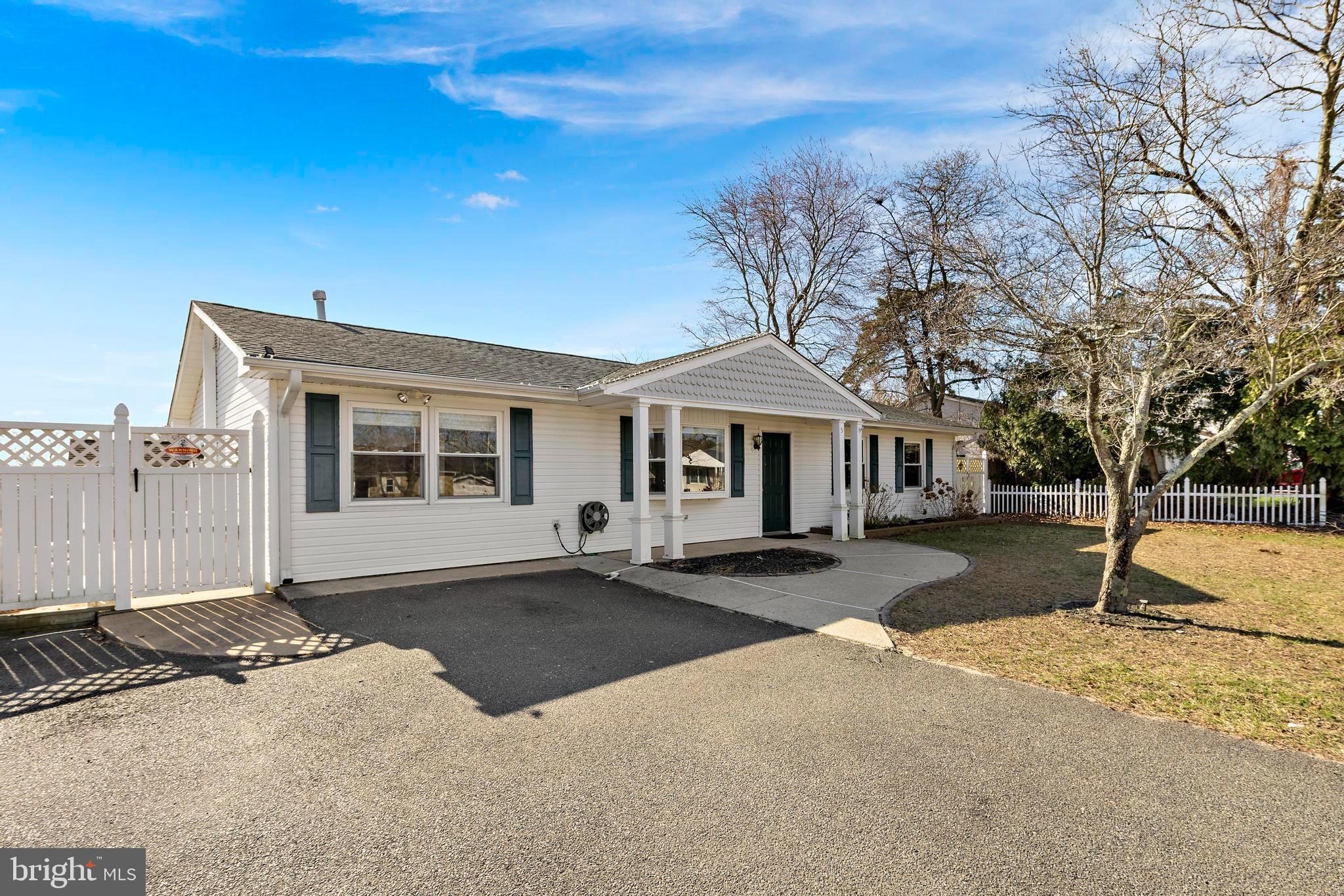 5 Fresno Street Barnegat, NJ 08005 - Photo 2 of 43 a front view of a house with a yard