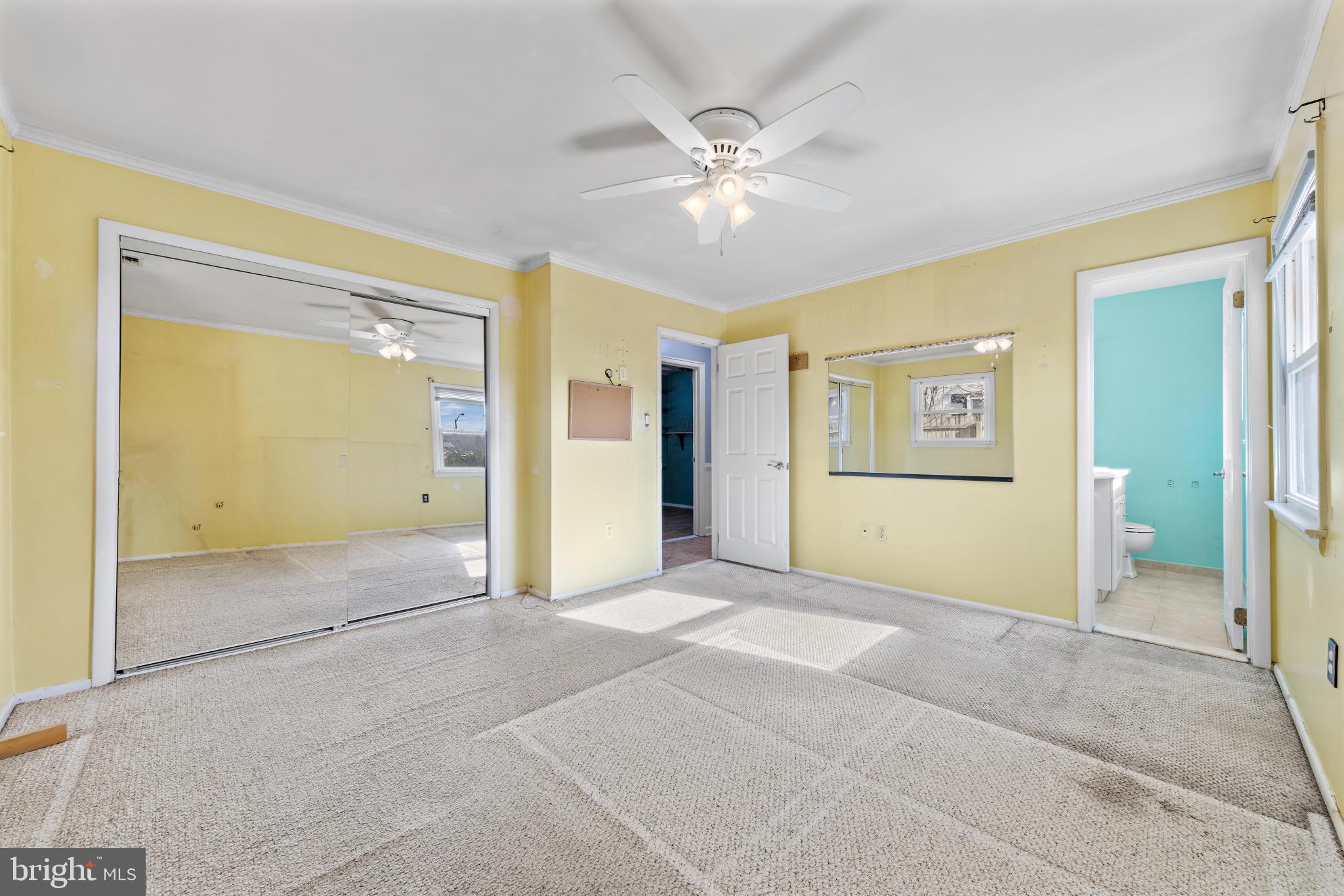 5 Fresno Street Barnegat, NJ 08005 - Photo 21 of 43 a view of an empty room with closet and a chandelier fan