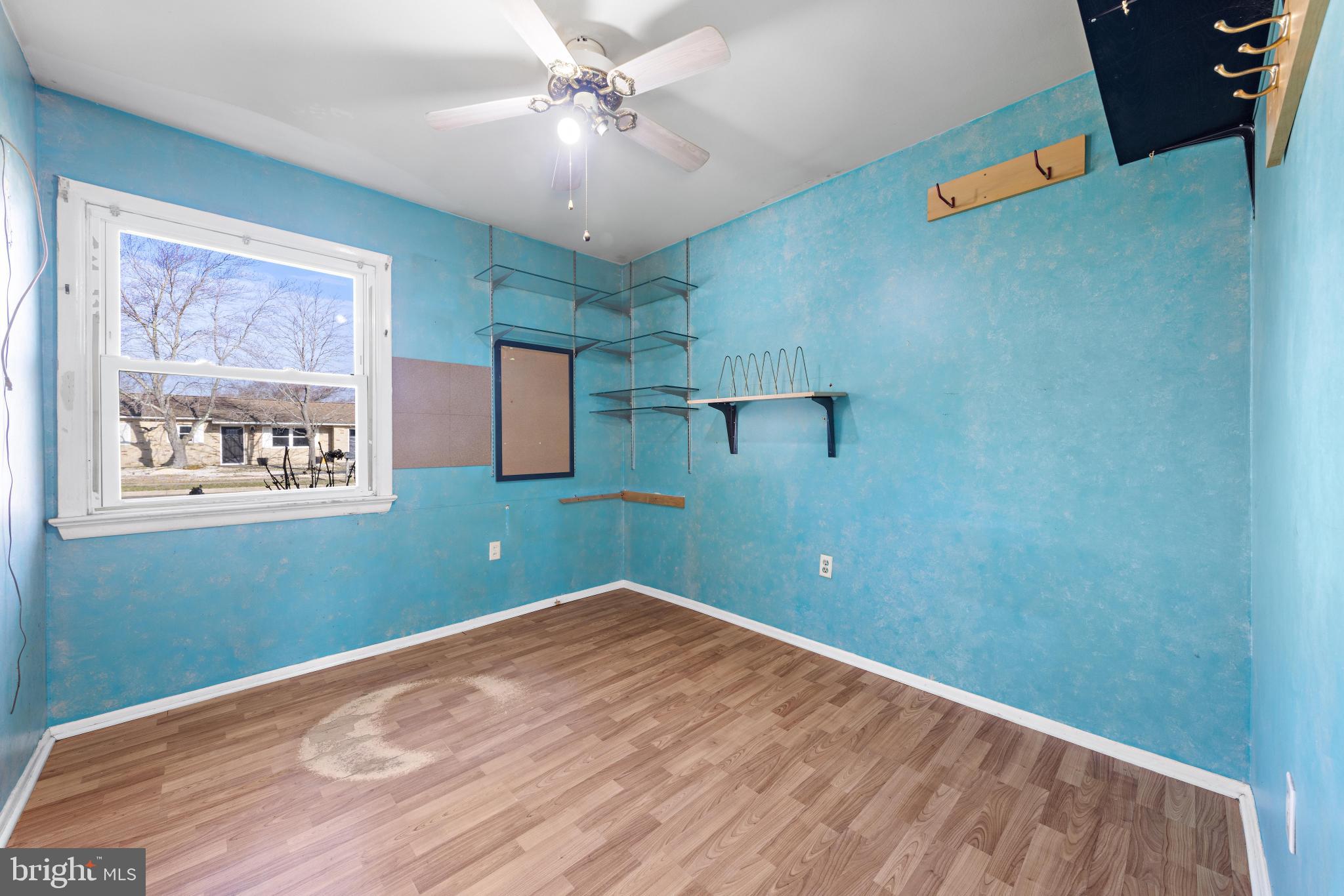5 Fresno Street Barnegat, NJ 08005 - Photo 23 of 43 a view of a room with a ceiling fan and wooden floor