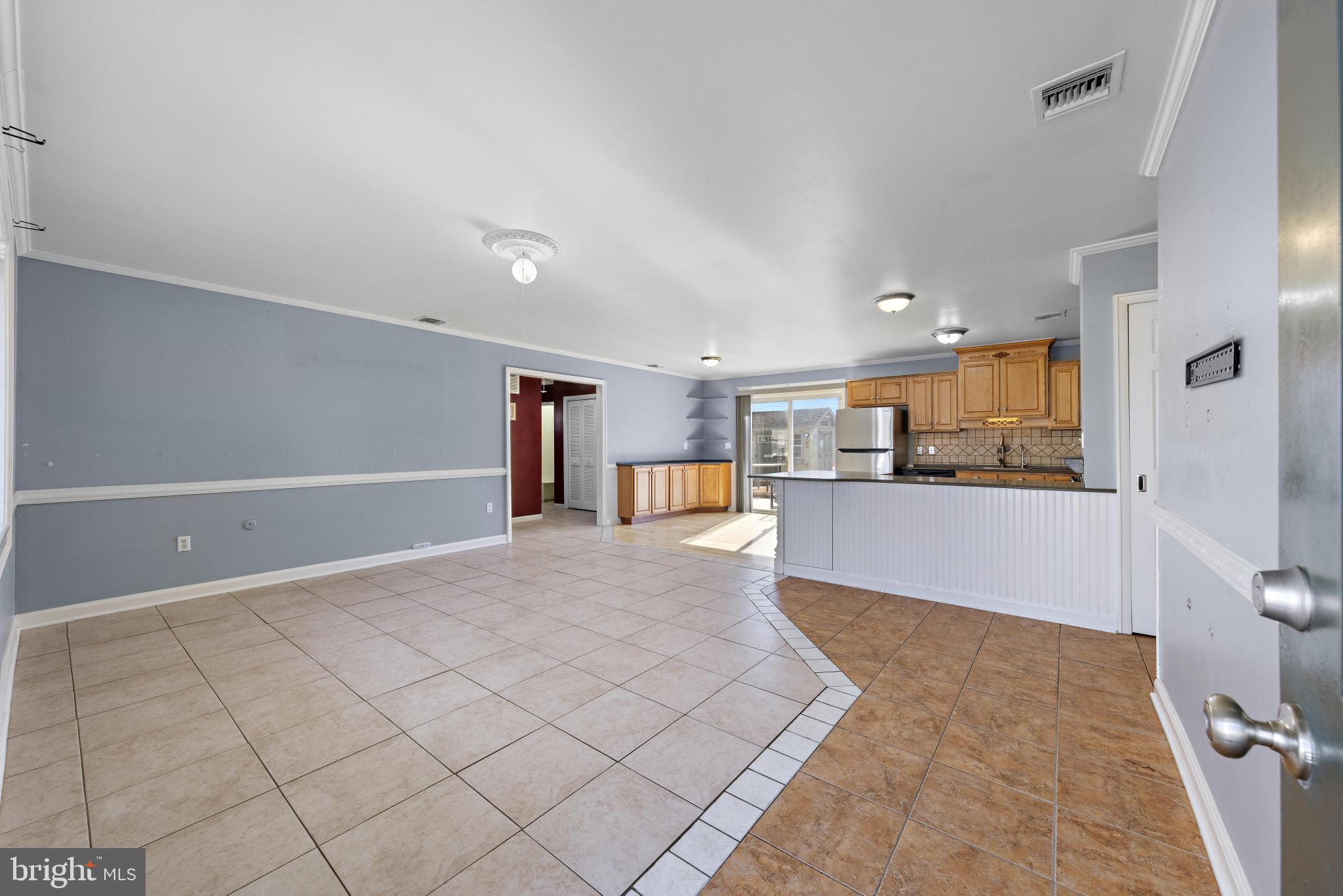 5 Fresno Street Barnegat, NJ 08005 - Photo 5 of 43 a view of kitchen and kitchen with furniture