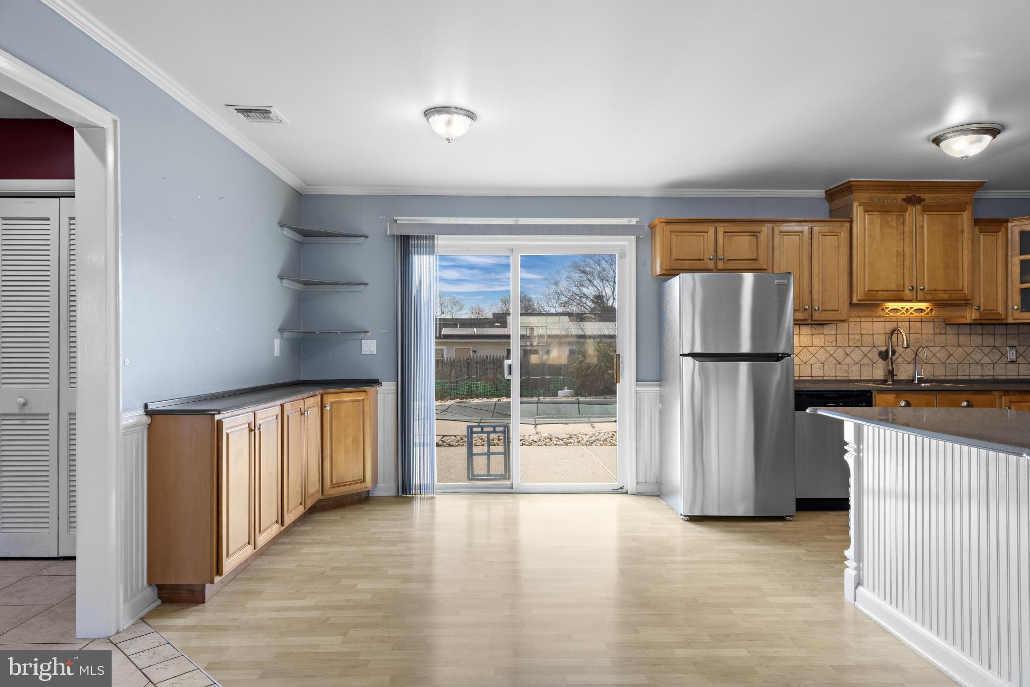 5 Fresno Street Barnegat, NJ 08005 - Photo 9 of 43 a view of a kitchen with a refrigerator a sink and dishwasher