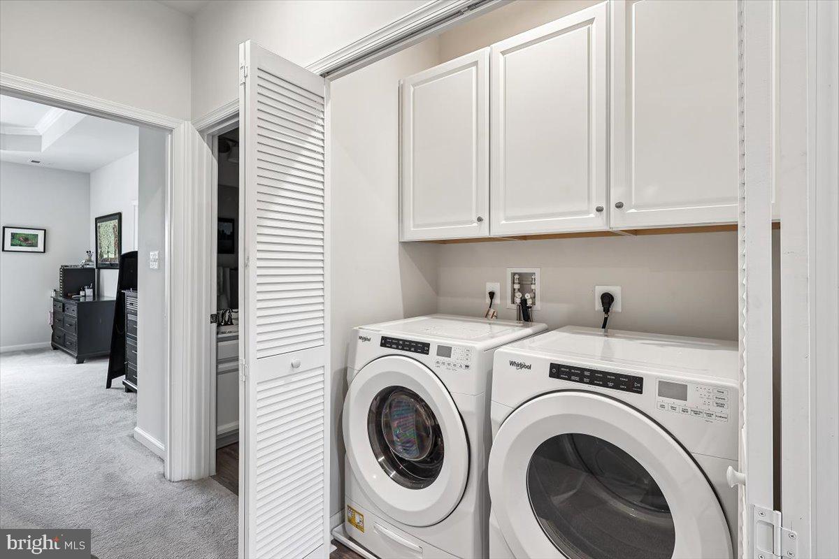 7838 Mine Run Road Hanover, MD 21076 - Photo 24 of 30 a view of hallway with washer and dryer
