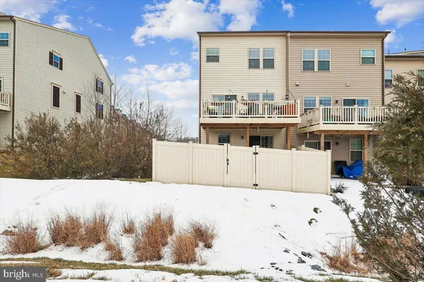 a view of house with yard