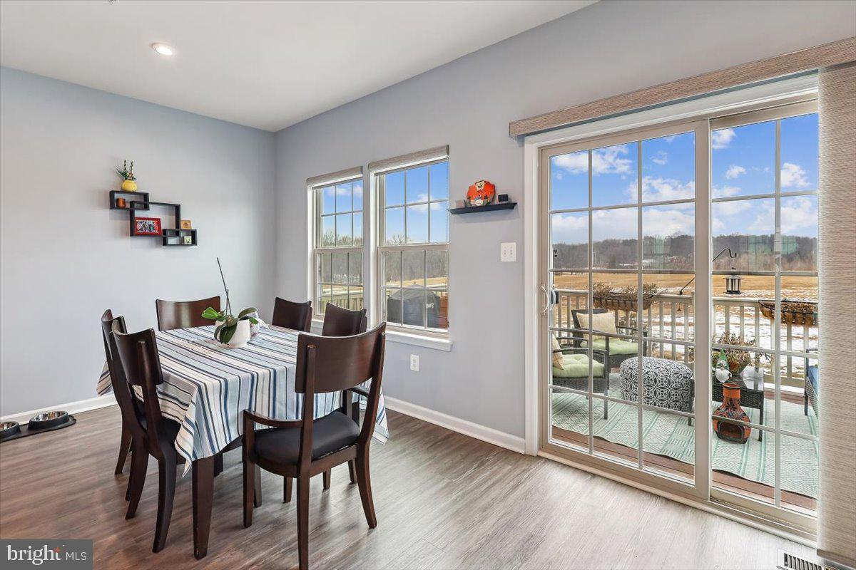 7838 Mine Run Road Hanover, MD 21076 - Photo 7 of 30 a dining room with furniture and window