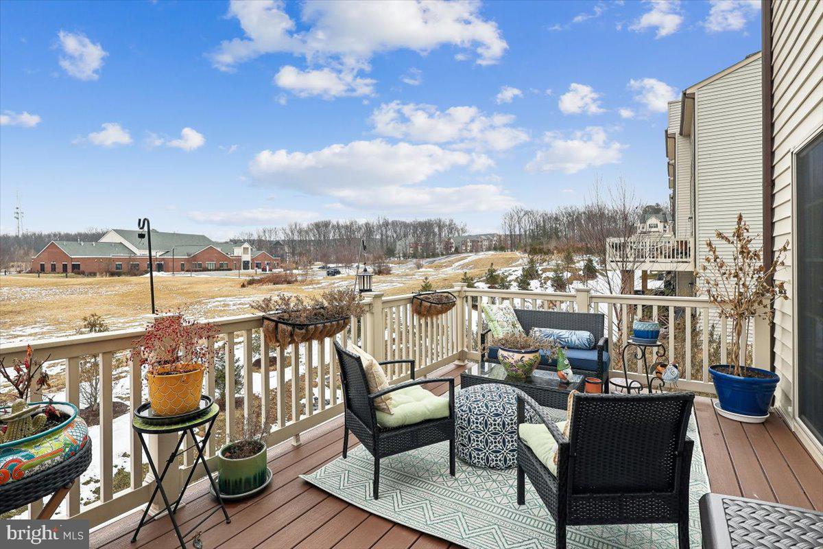 7838 Mine Run Road Hanover, MD 21076 - Photo 9 of 30 a view of a balcony with chairs