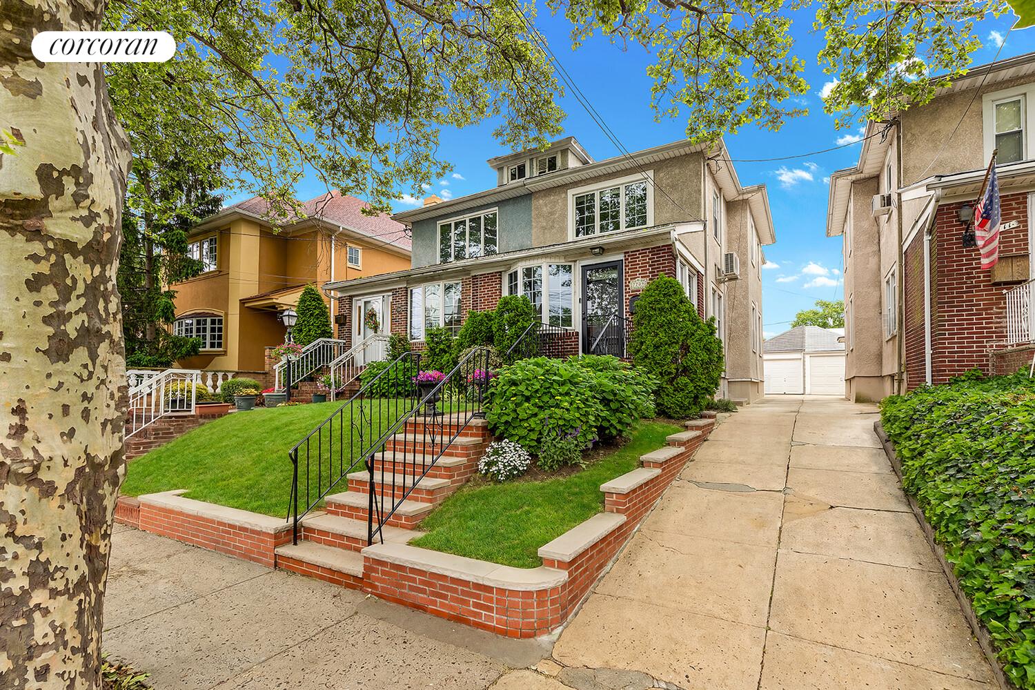 7709 Colonial Road Brooklyn, NY 11209 - Photo 1 of 13 a front view of a building with a garden