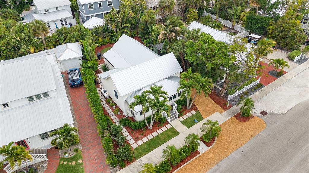 340 Palm Avenue Boca Grande, FL 33921 - Photo 34 of 38 an aerial view of a house with a yard and garden
