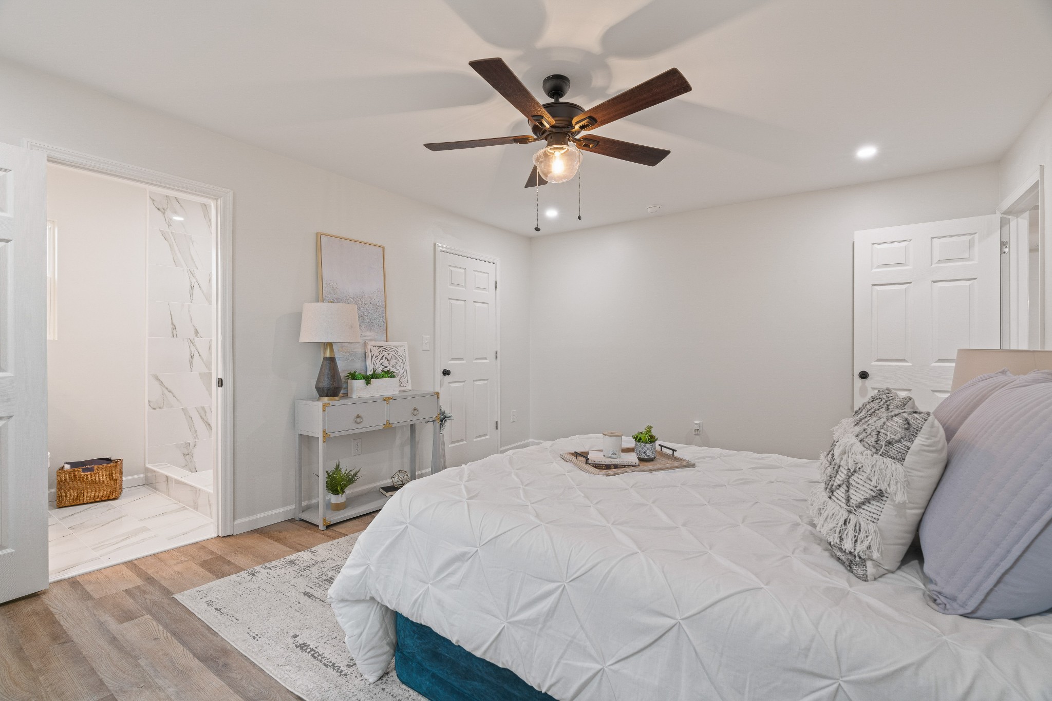 5284 Flewellyn Road Springfield, TN 37172 - Photo 32 of 57 a bedroom with a bed and a chandelier