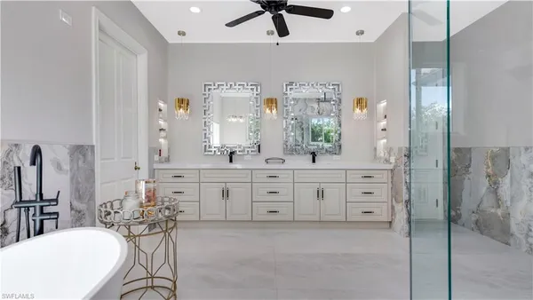 a view of swimming pool with seating area