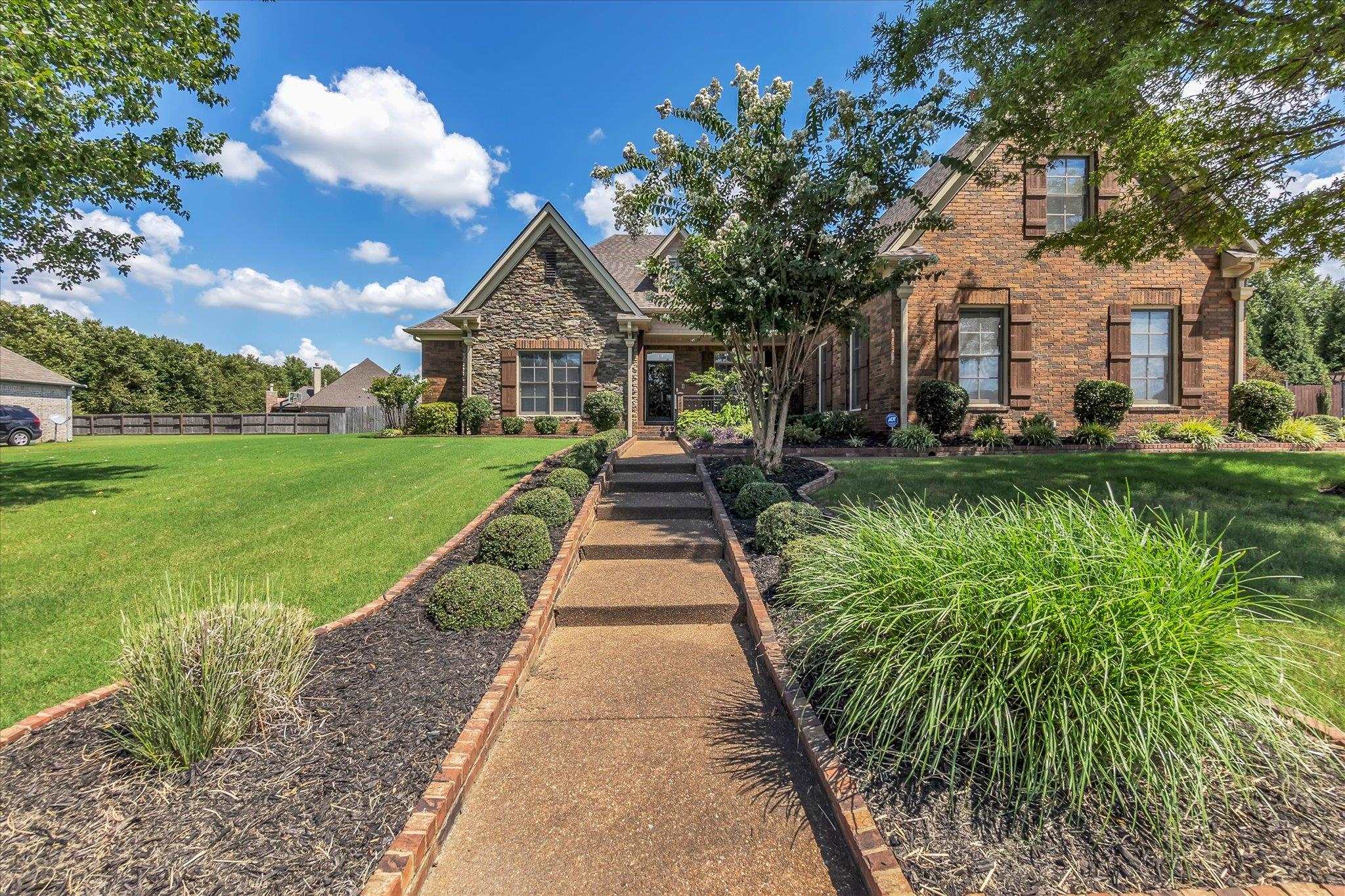 7284 Bucknell Road Millington, TN 38053 - Photo 1 of 35 Brick and stone exterior with gabled roofing