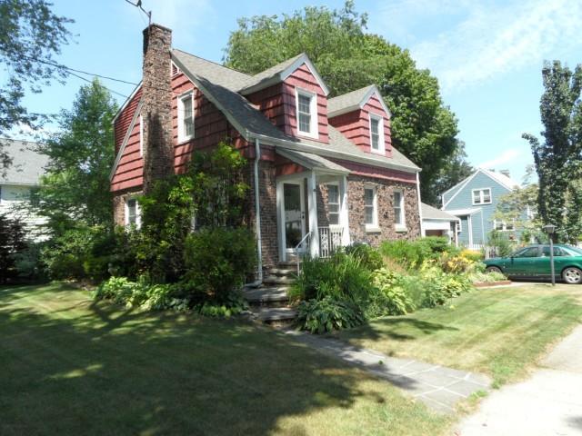380 Reed Street Stratford, CT 06614 - Photo 1 of 1 a front view of house with yard and green space
