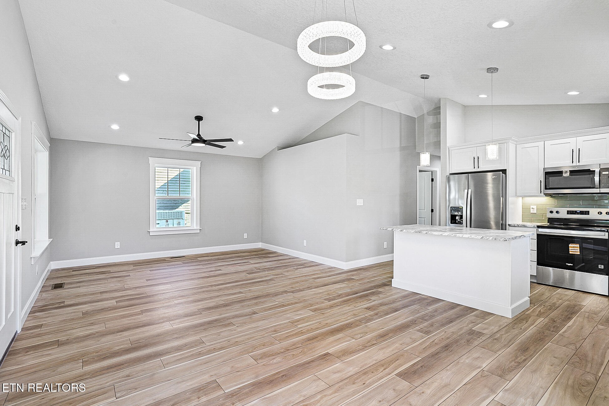 1134 Rider Avenue Knoxville, TN 37917 - Photo 12 of 44 a view of kitchen and sink with wooden floor