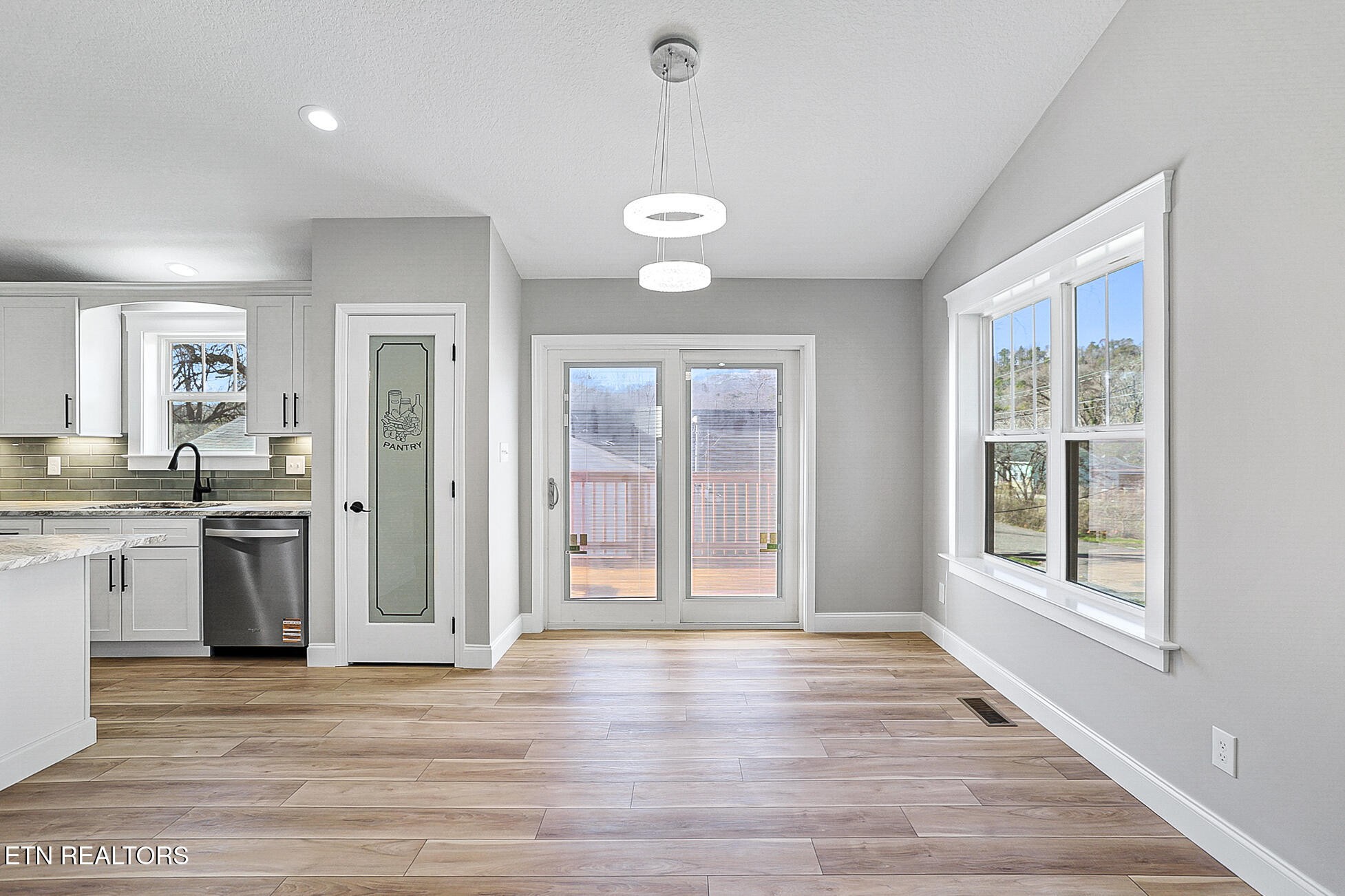 1134 Rider Avenue Knoxville, TN 37917 - Photo 20 of 44 a view of an empty room with window and wooden floor
