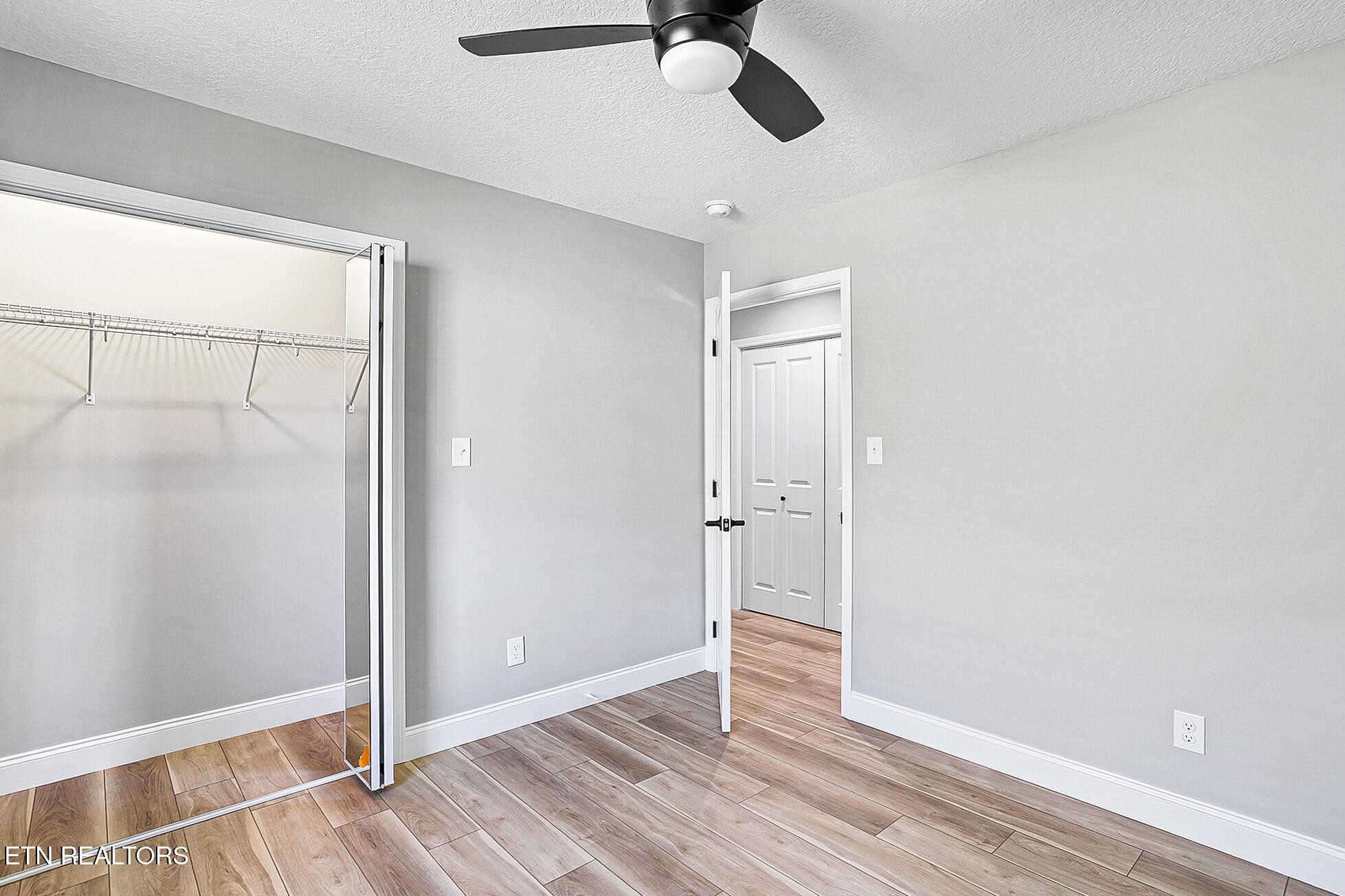 1134 Rider Avenue Knoxville, TN 37917 - Photo 38 of 44 a view of empty room with wooden floor