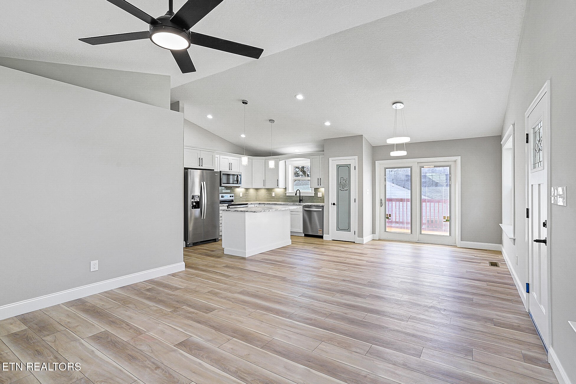 1134 Rider Avenue Knoxville, TN 37917 - Photo 10 of 44 a view of kitchen with wooden floor and window