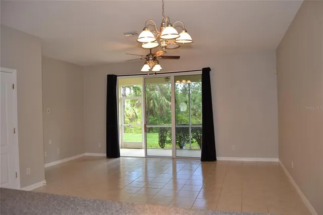 a view of a kitchen and a window