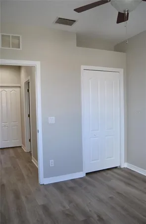 a view of a hallway with closet area