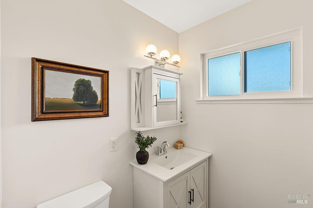 878 Pauline Court Santa Rosa, CA 95401 - Photo 17 of 36 a bathroom with a sink and a mirror