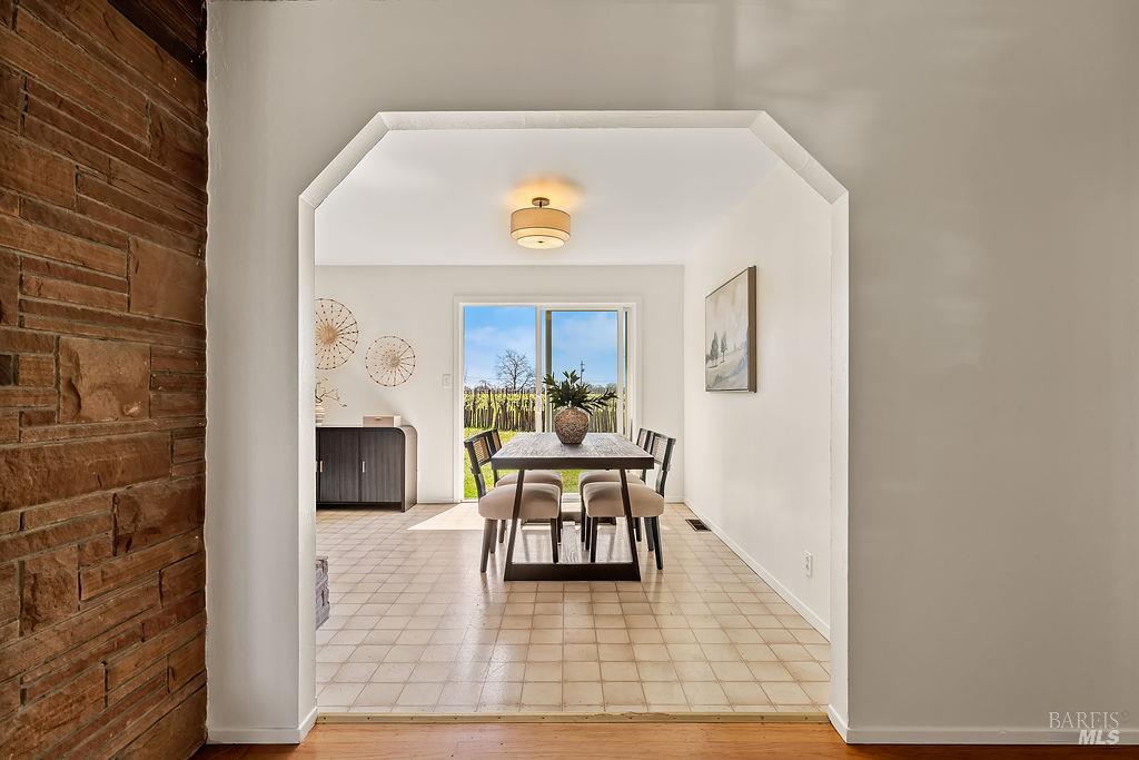 878 Pauline Court Santa Rosa, CA 95401 - Photo 6 of 36 a view of a dining room with furniture window and wooden floor