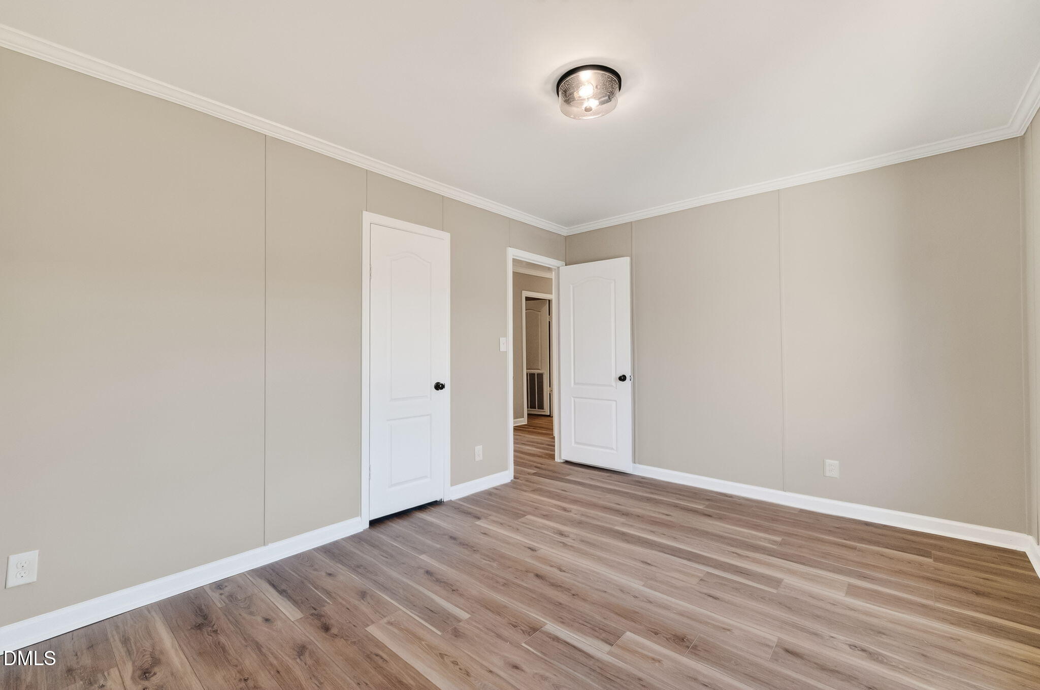 10015 Smith Road Middlesex, NC 27557 - Photo 35 of 48 a view of an empty room with wooden floor