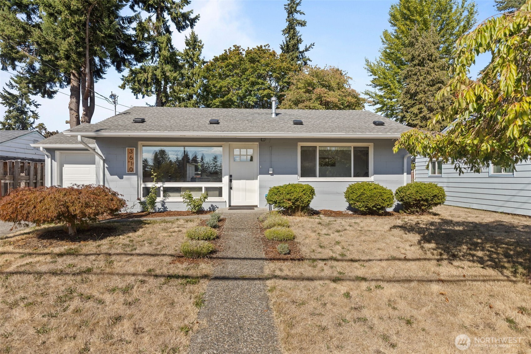3610 Northeast 6th Street Renton, WA 98056 - Photo 1 of 33 a view of a house with a patio