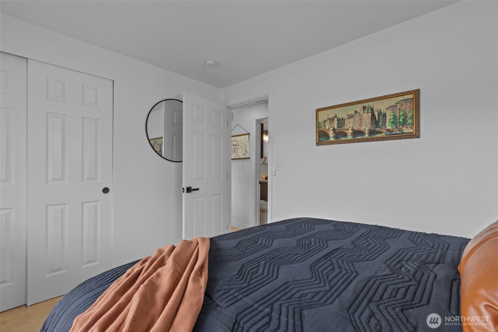 3610 Northeast 6th Street Renton, WA 98056 - Photo 14 of 33 a bedroom with a bed and a painting on the wall