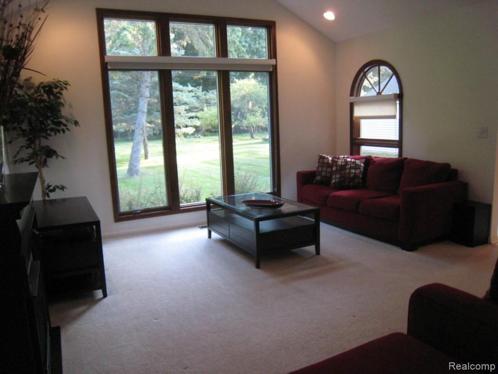 8568 Rucker Road Grosse Ile, MI 48138 - Photo 12 of 24 Vaulted ceiling in family room