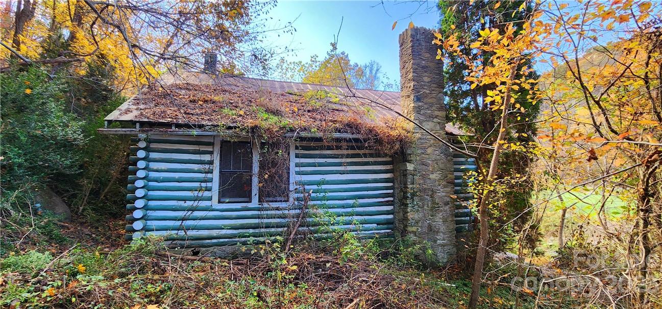 201 Clifford Fowler Road Hot Springs, NC 28743 - Photo 6 of 47 a view of a house with a yard