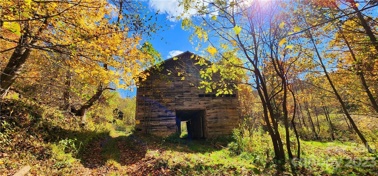 201 Clifford Fowler Road Hot Springs, NC 28743 - Photo 8 of 47 a front view of a house with a yard