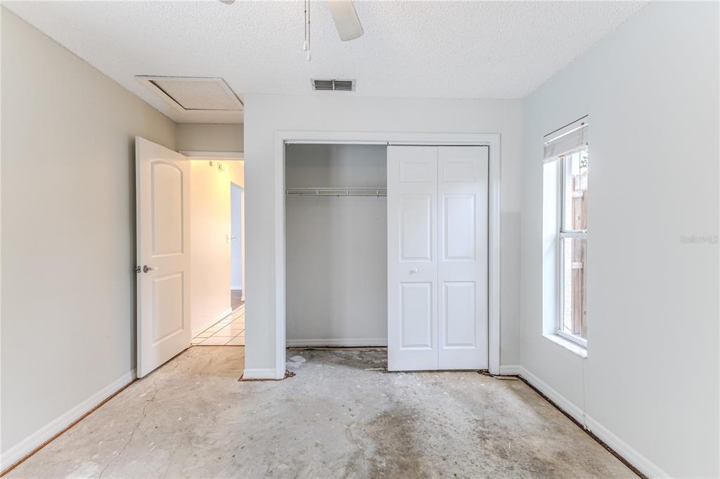 2489 Amherst Avenue Spring Hill, FL 34609 - Photo 25 of 45 a view of an empty room and window