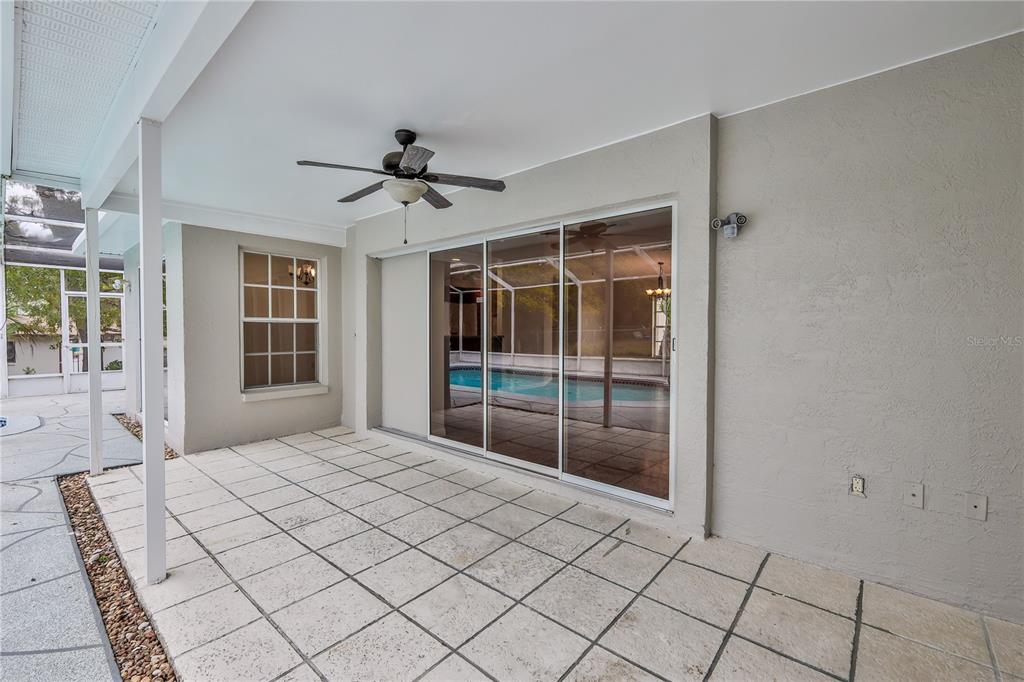 2489 Amherst Avenue Spring Hill, FL 34609 - Photo 34 of 45 a bedroom with a bed and a window