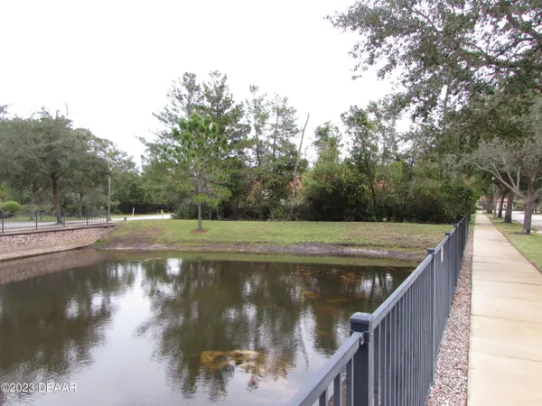 a view of a swimming pool from a balcony