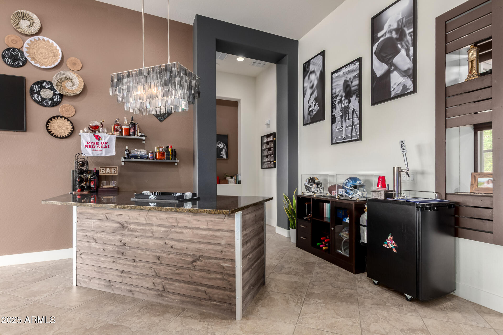 9156 West Bajada Road Peoria, AZ 85383 - Photo 10 of 97 a kitchen view of a dining table chairs and clock on the wall