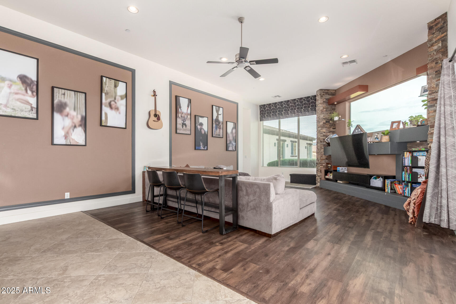 9156 West Bajada Road Peoria, AZ 85383 - Photo 15 of 97 a living room with furniture and a large window