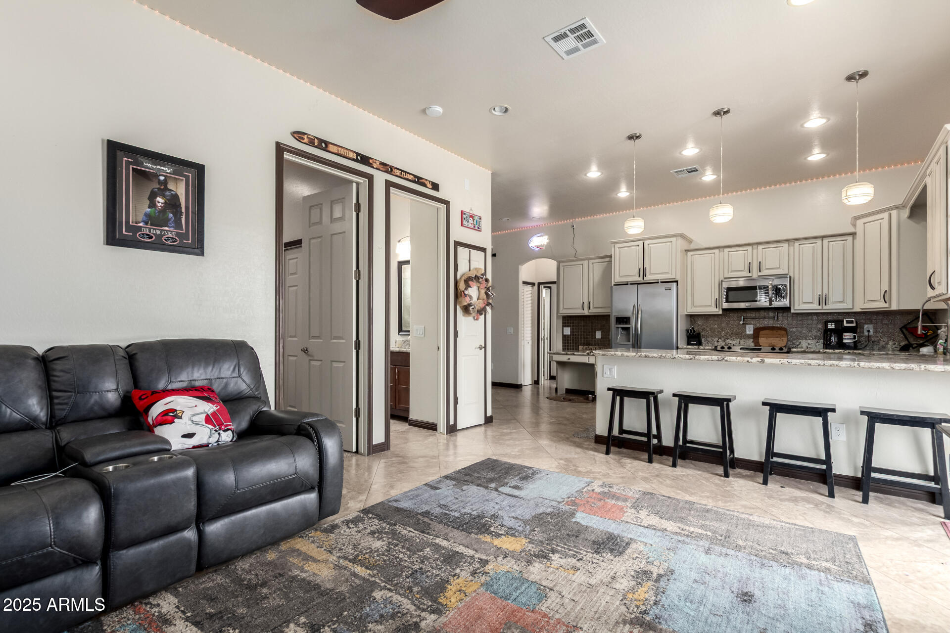 9156 West Bajada Road Peoria, AZ 85383 - Photo 51 of 97 a living room with furniture and kitchen view
