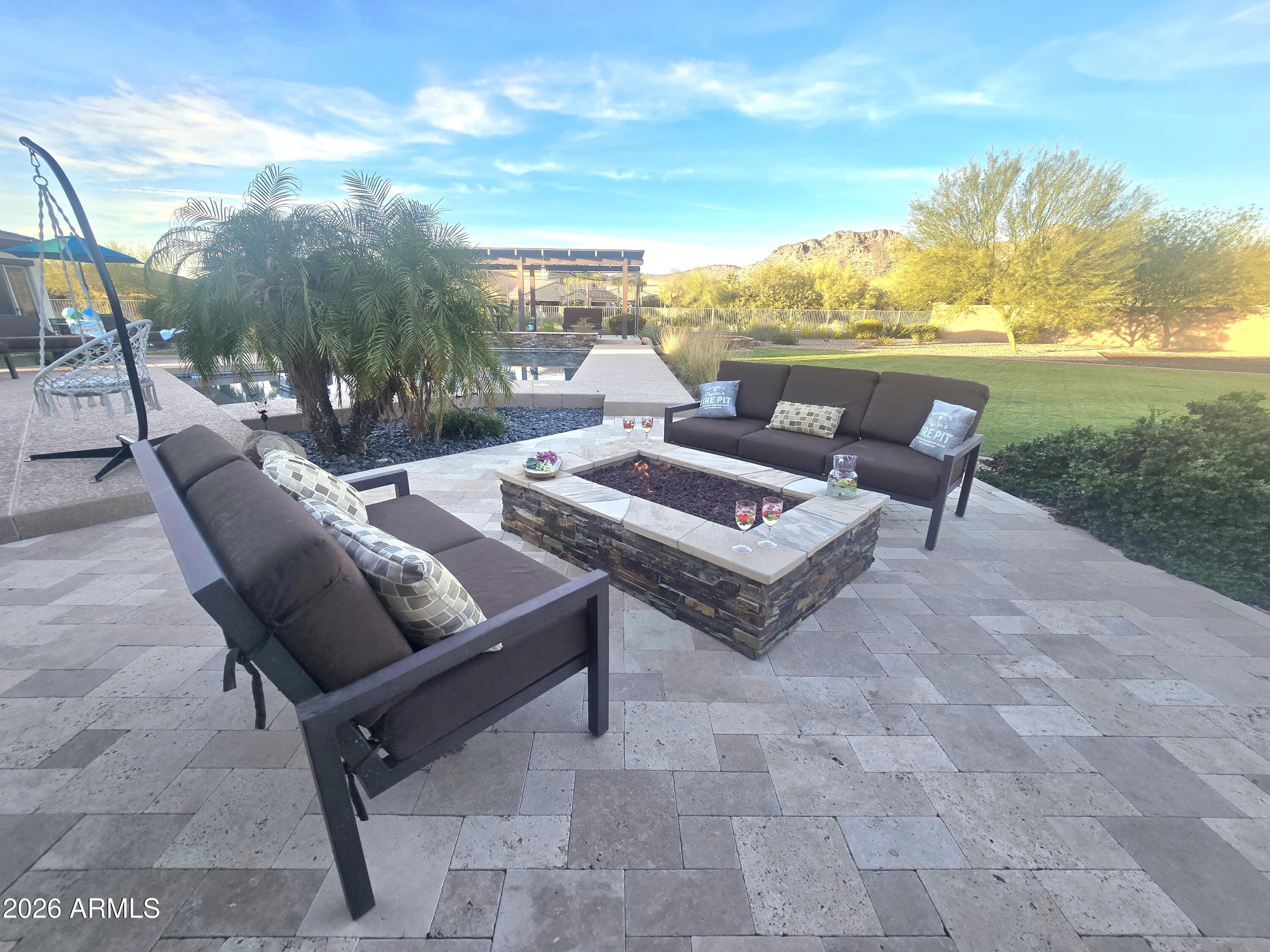 9156 West Bajada Road Peoria, AZ 85383 - Photo 59 of 88 a view of a terrace with furniture and a terrace