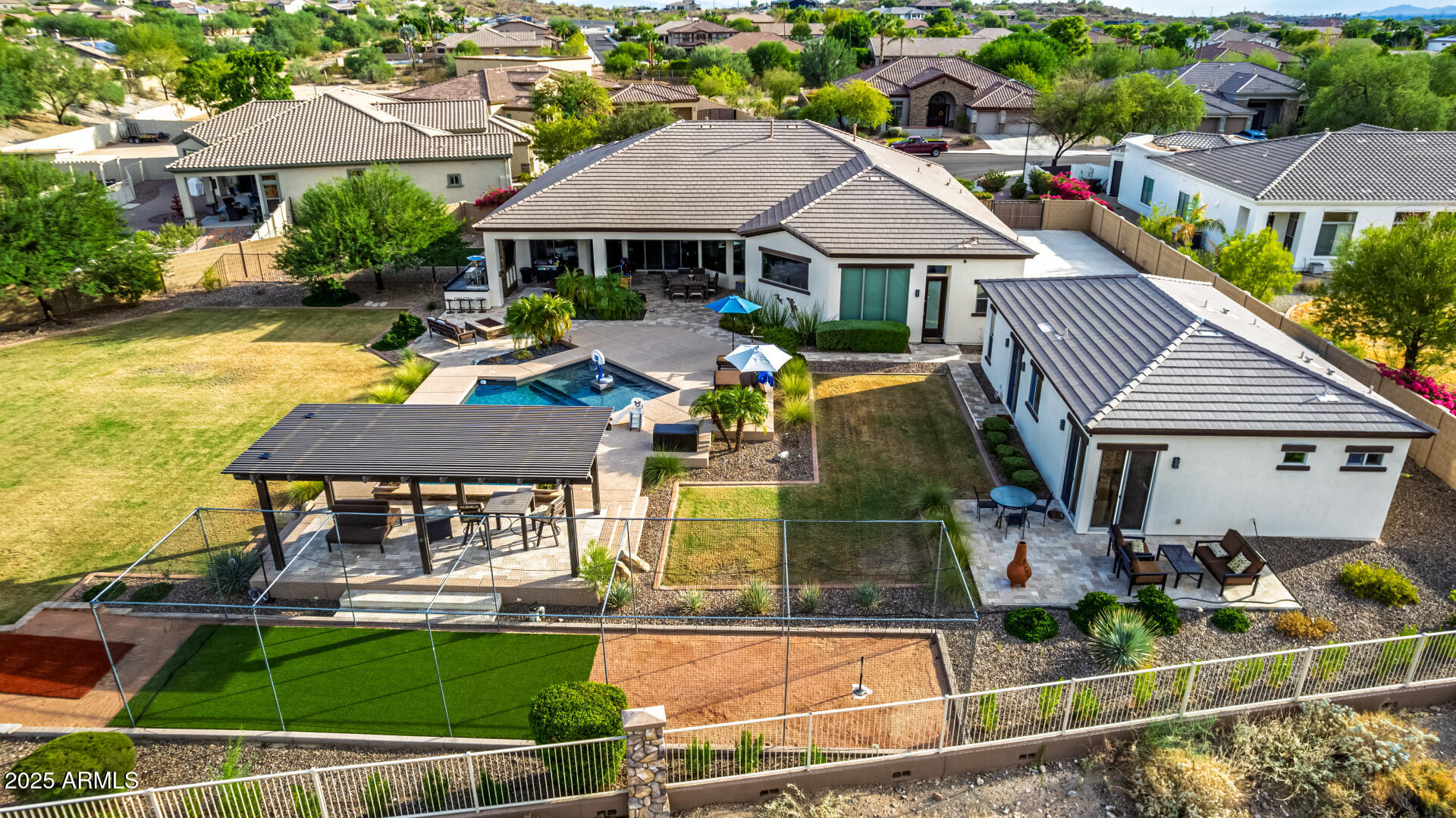 9156 West Bajada Road Peoria, AZ 85383 - Photo 91 of 97 an aerial view of a house with swimming pool garden and patio